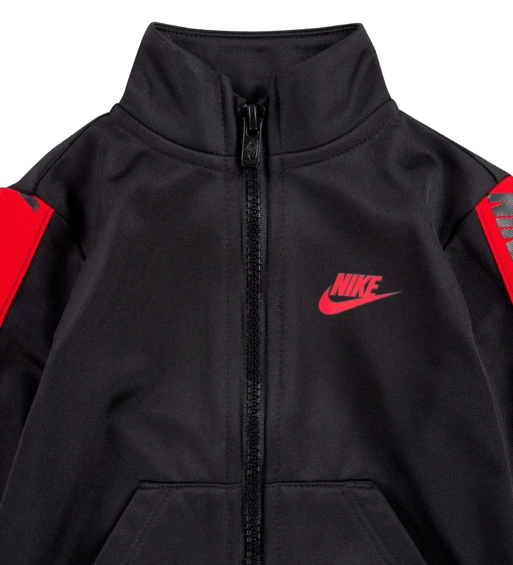 NIKE TRAININGSPAK  CARDIGAN/BROEK  ZWART M. ROOD