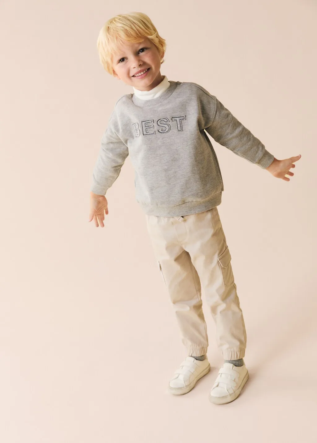 Sweatshirt met geborduurde boodschap